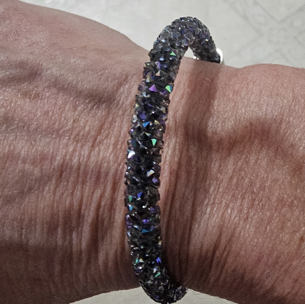 NWOT SWAROVSKI CRYSTALDUST CUFF BRACELET IN PURPLE